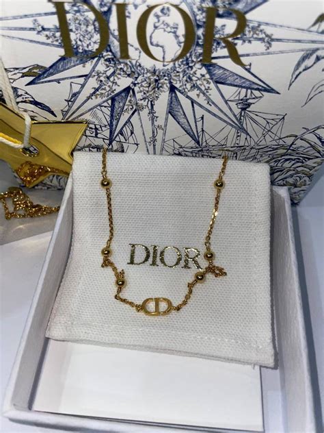 christian dior petit cd necklace|Dior letters necklace value.